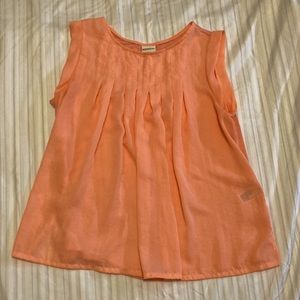 Sleeveless orange pleated top size small.